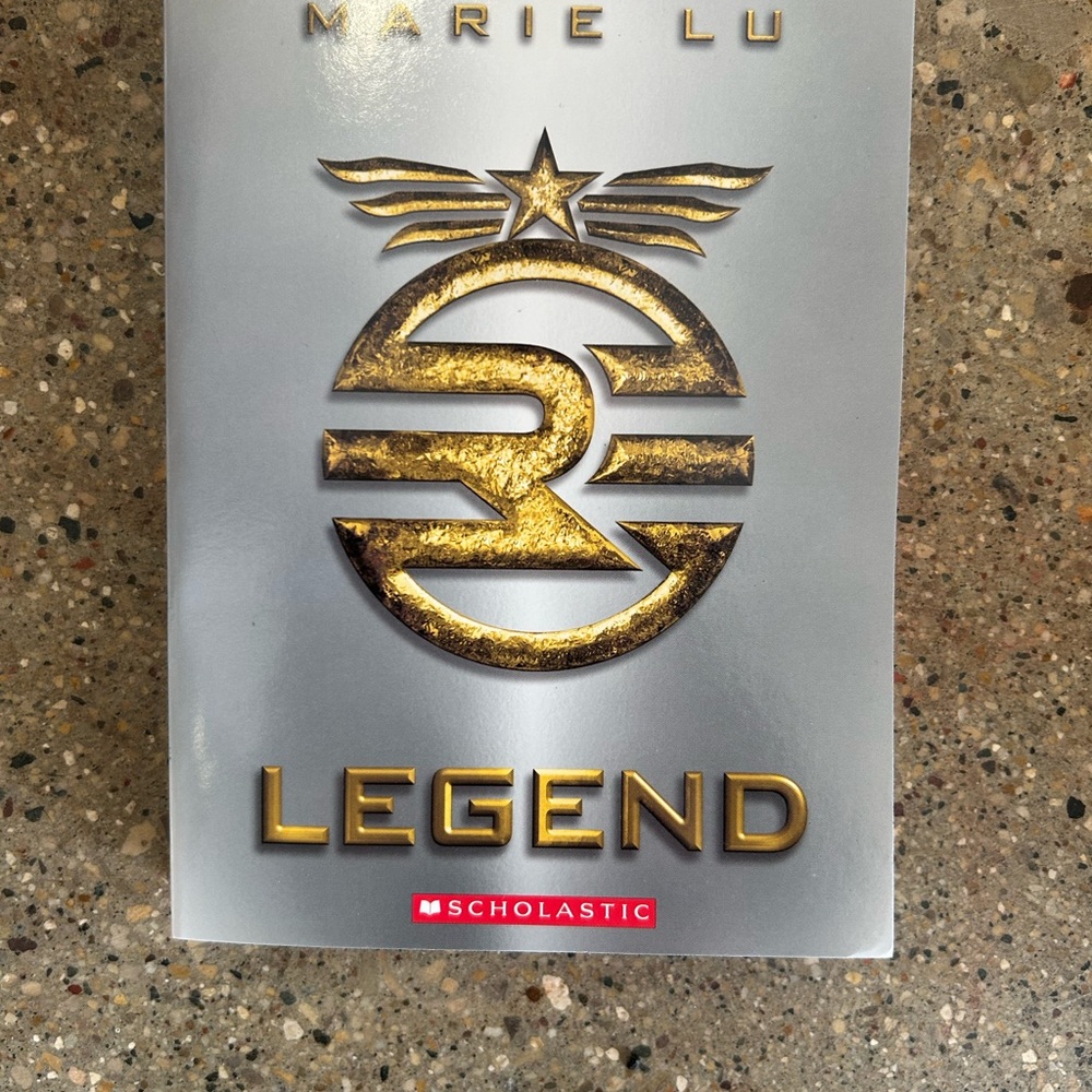 Scholastic Legend Hardcover with Gold and Silver Design